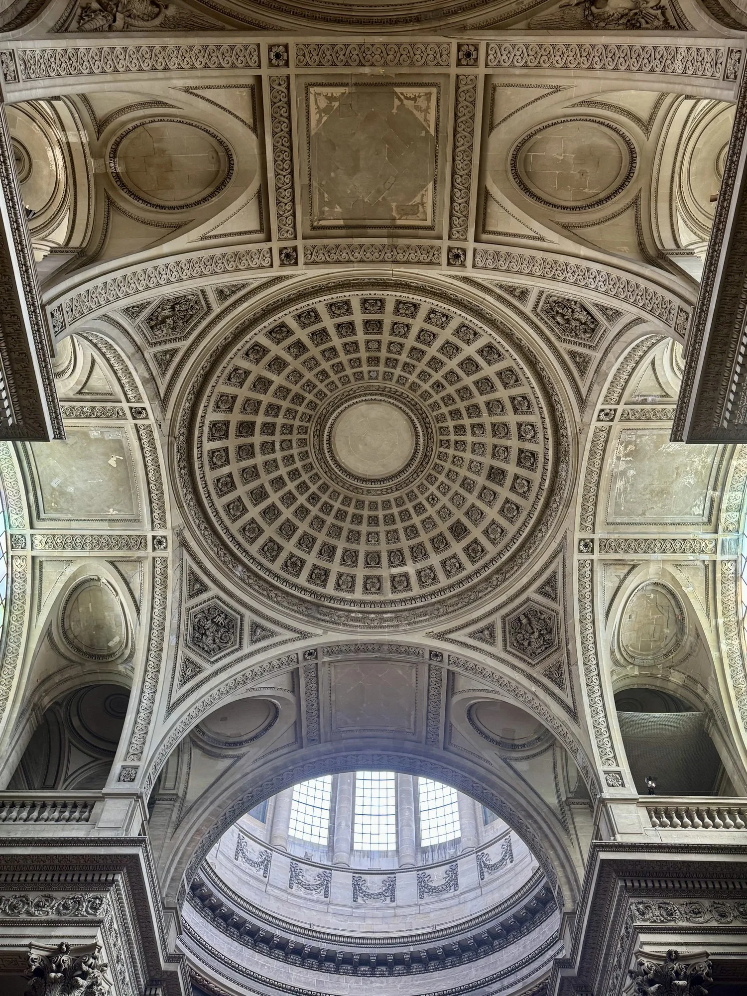 A coffered dome with the oculus at the top, straight up.