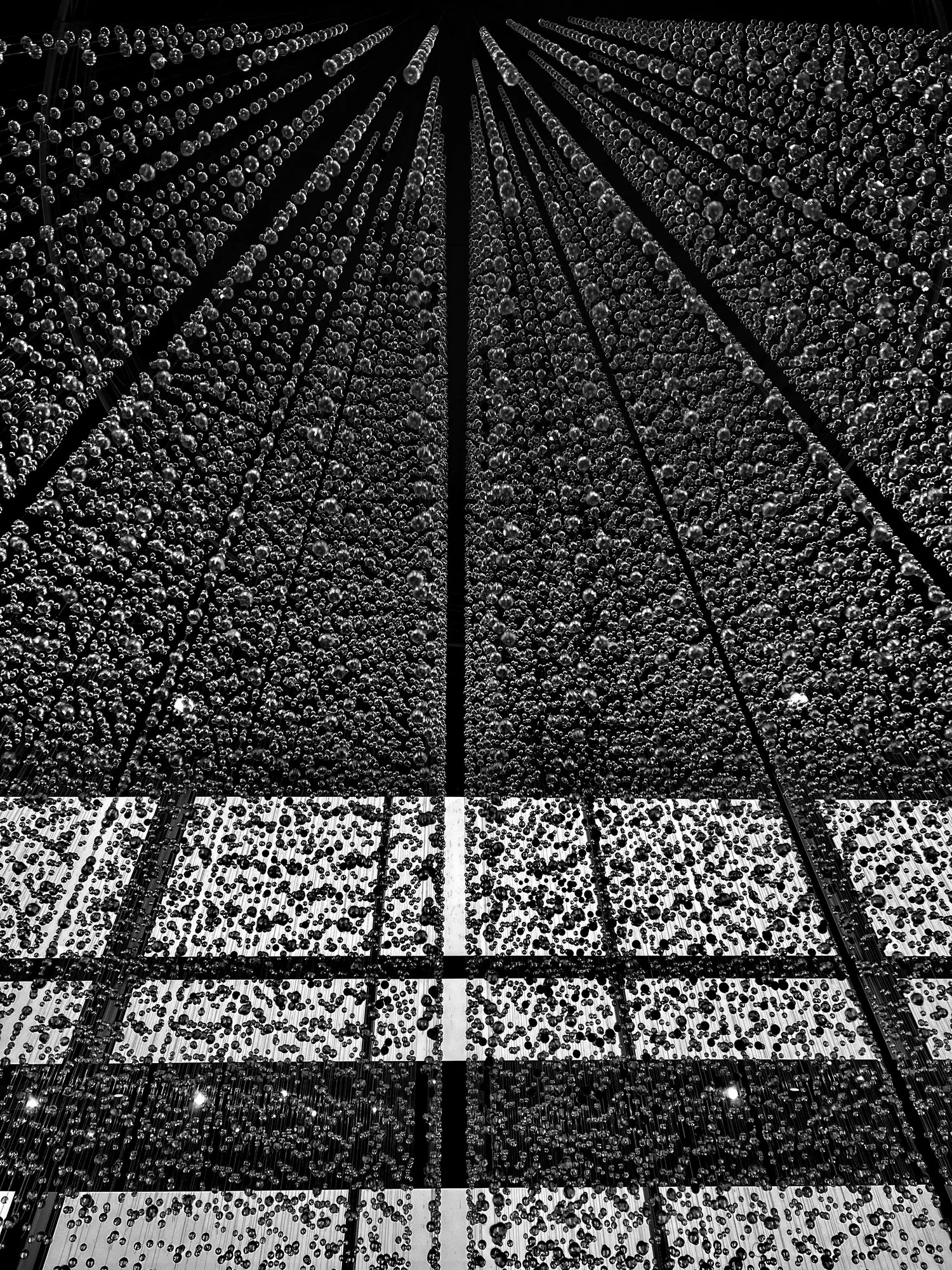Perforated ceiling, portrait, radiating to a point.