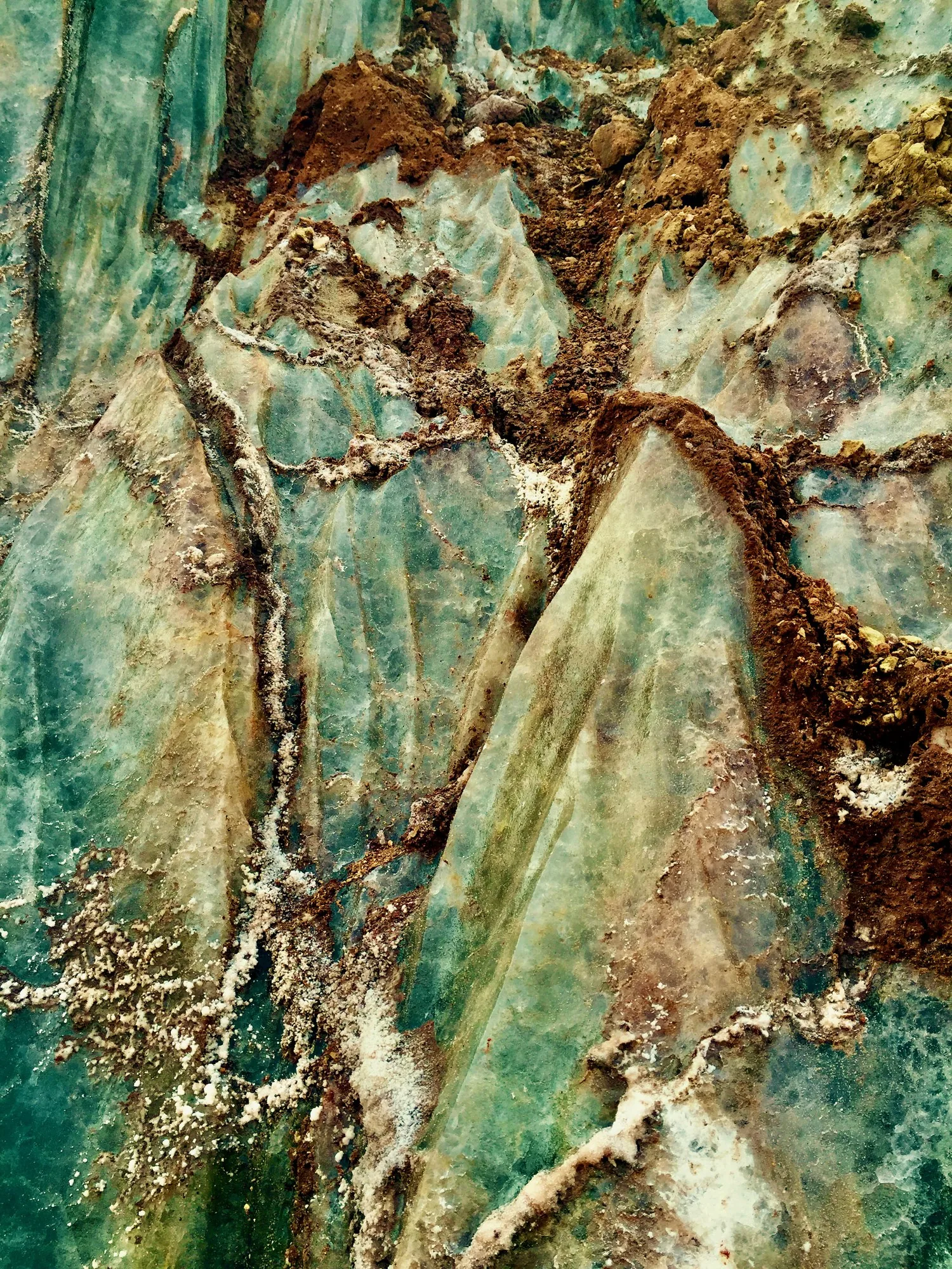Mineral, green and rust.